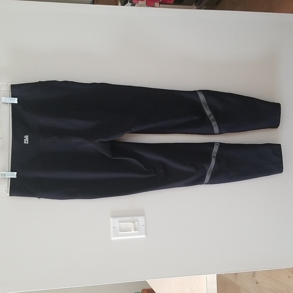 Fila Women's sport leggings with reflector strips zippers at bottom - Picture 7 of 7